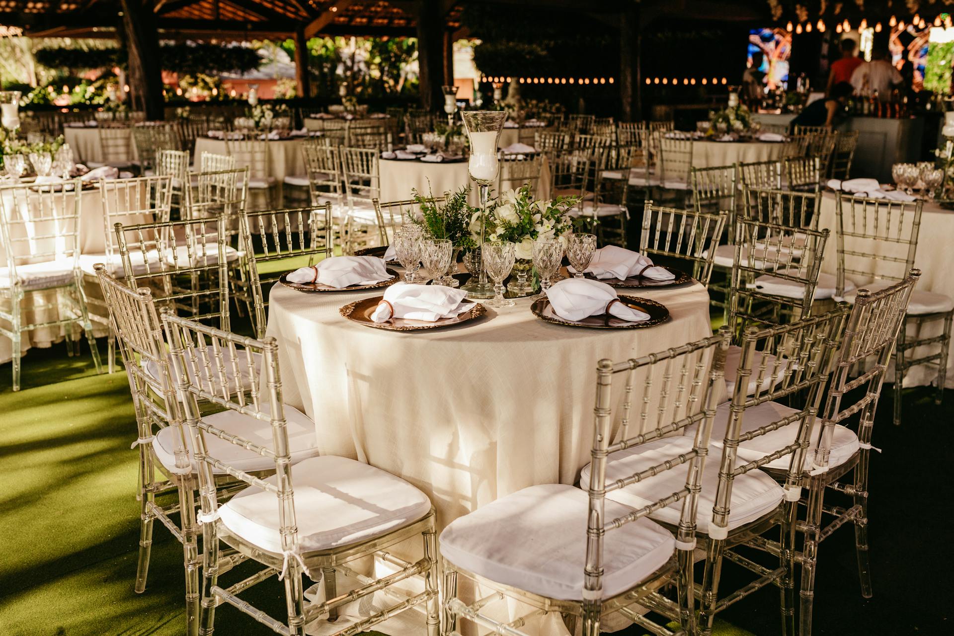 Elegant wedding reception venue with warm lighting and gold accents for a non-alcoholic celebration