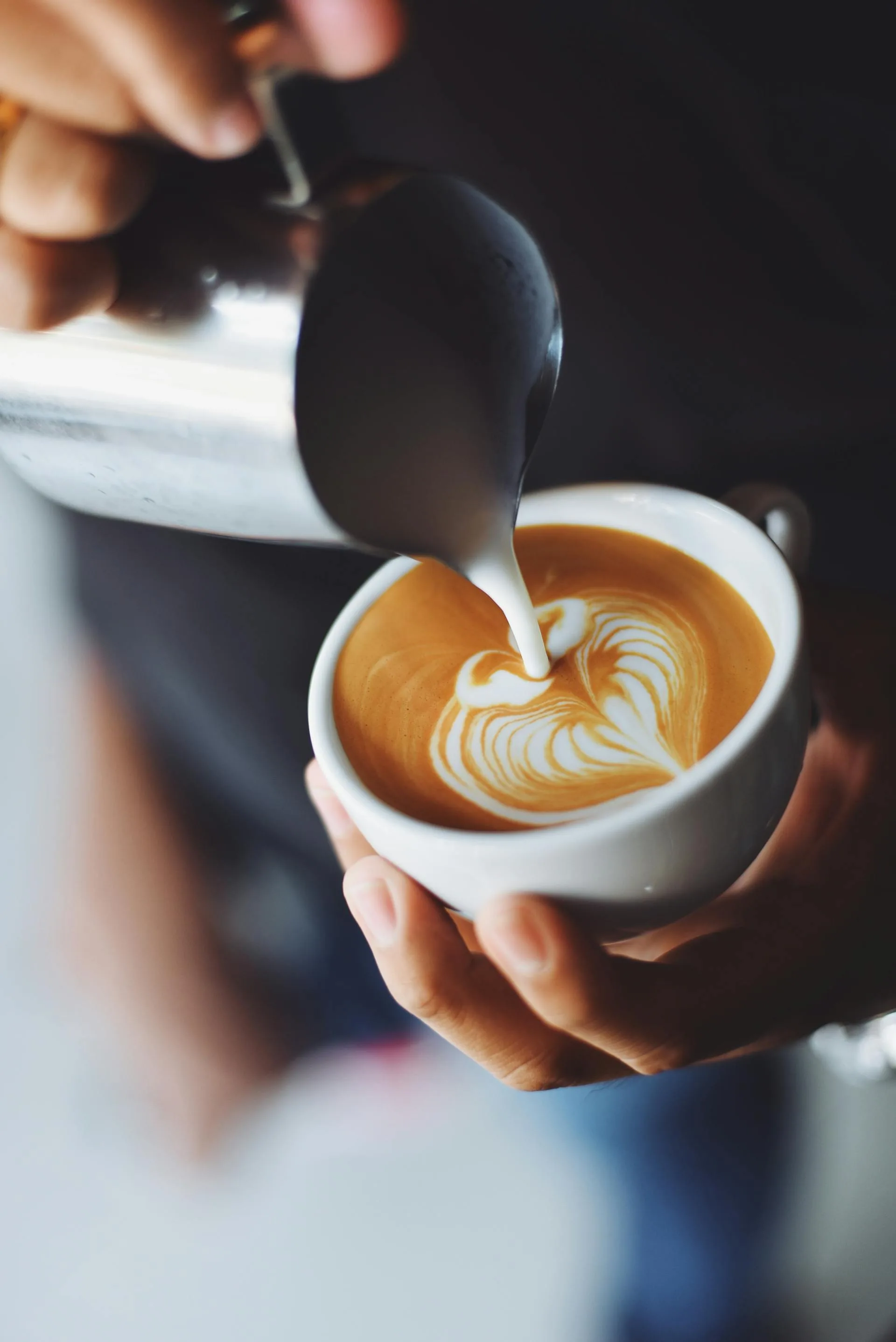 Close-up of a perfectly pulled espresso shot in a white cup — luxury espresso bar service by The Roaring Bean